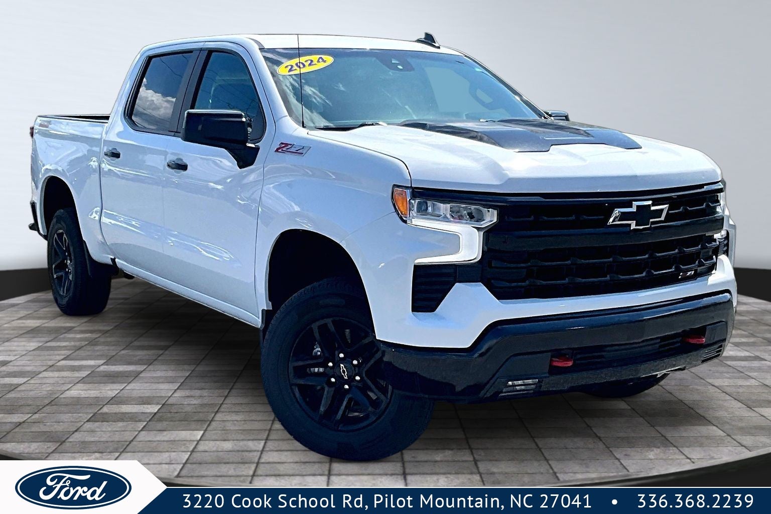 2024 Chevrolet Silverado 1500 LT Trail Boss in Summit White — front three-quarter view